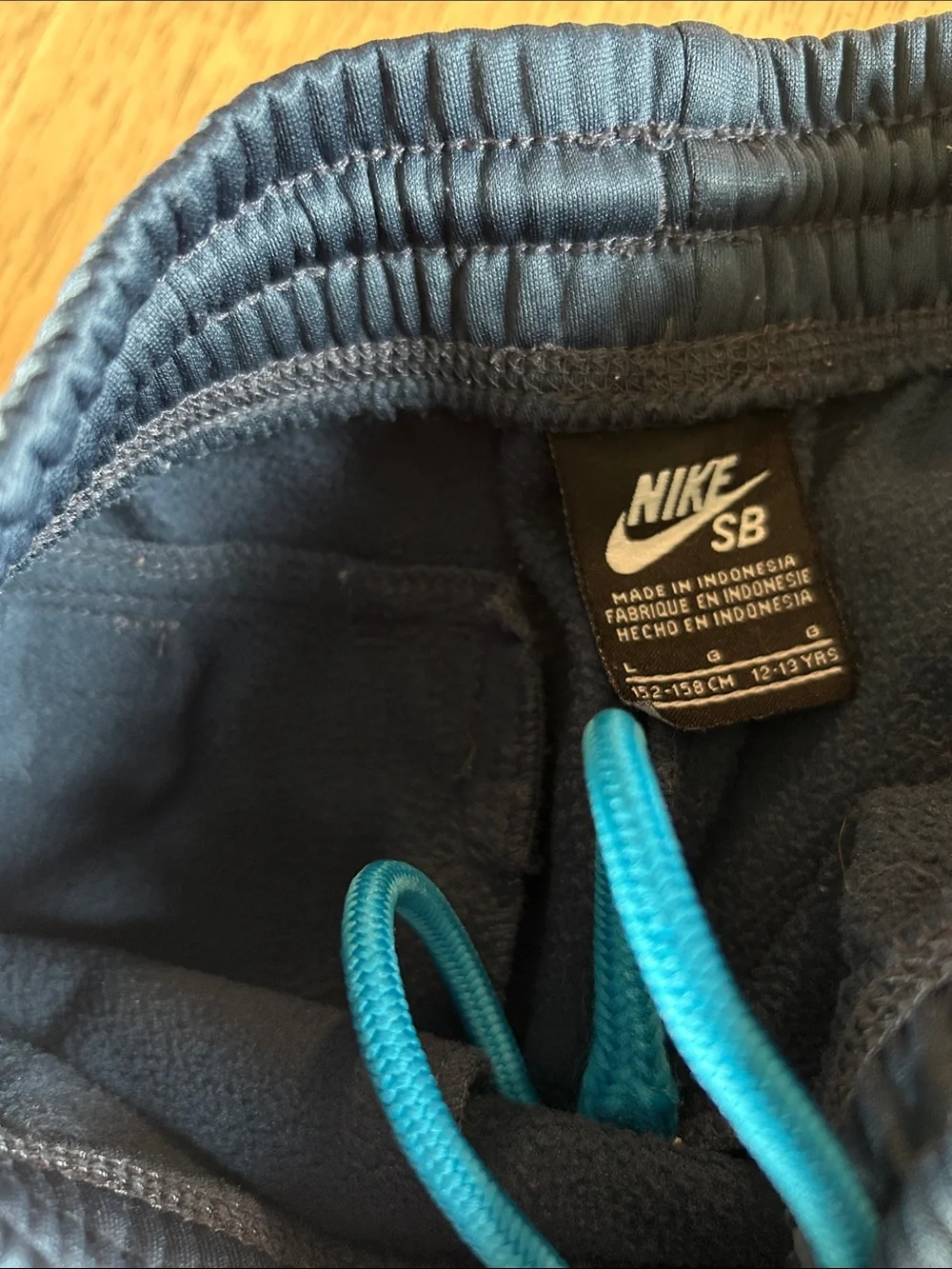 Nike Boys' Dark Navy Athletic Shorts with Teal Logo